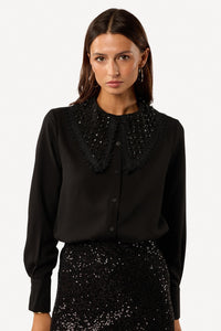 Plain blouse with jewel collar